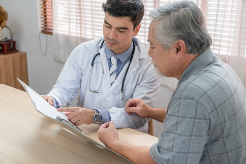 Doctor With Elderly Patient